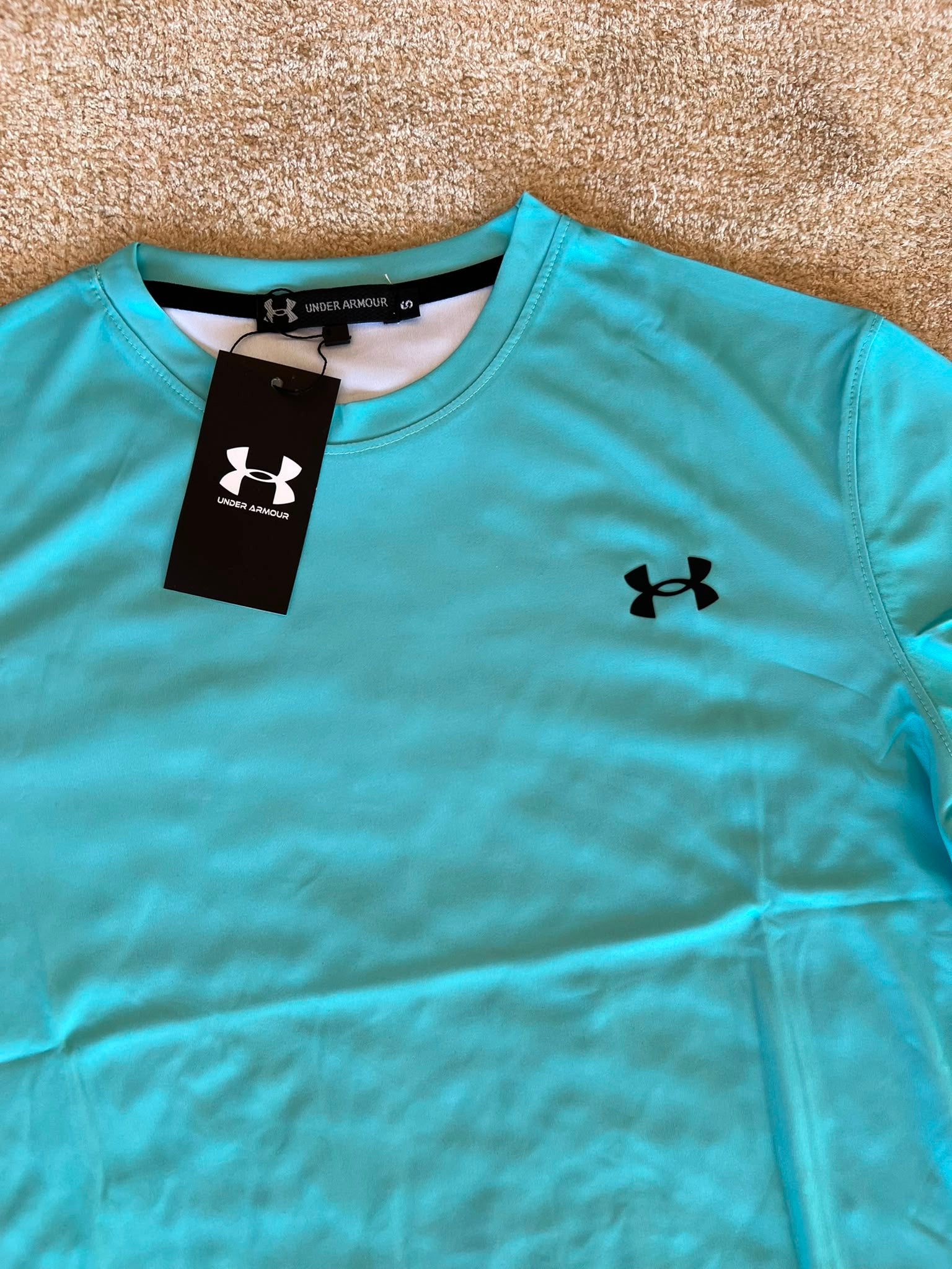 UNDER ARMOUR CONJUNTO CORTO